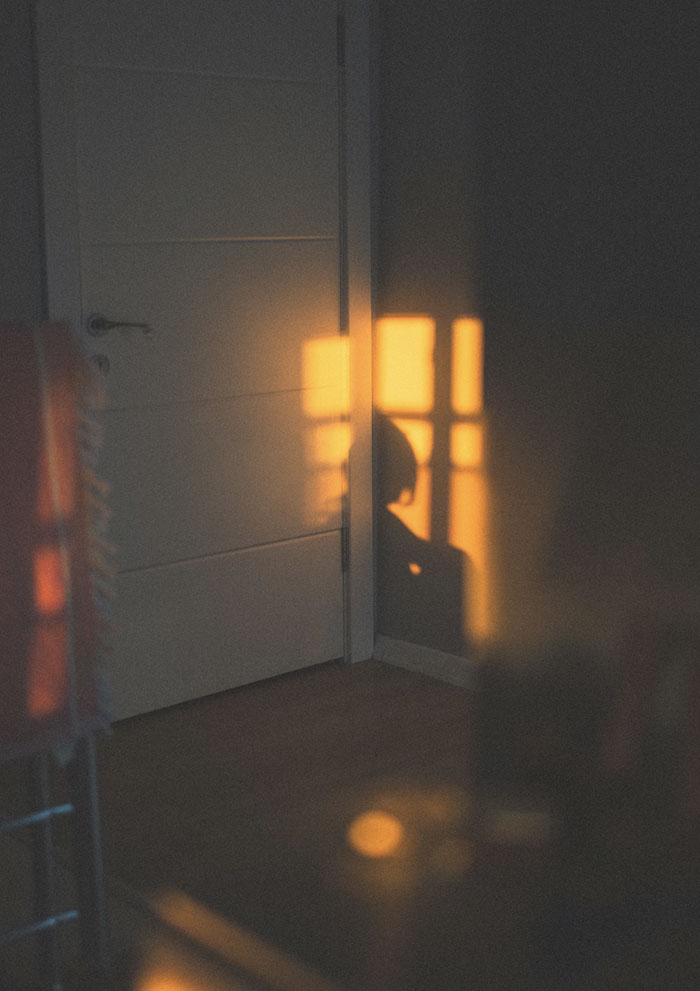 shadow of a woman sitting