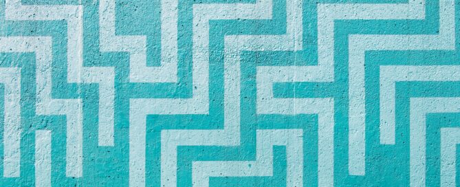 Abstract turquoise maze pattern symbolizing clarity emerging from confusion.